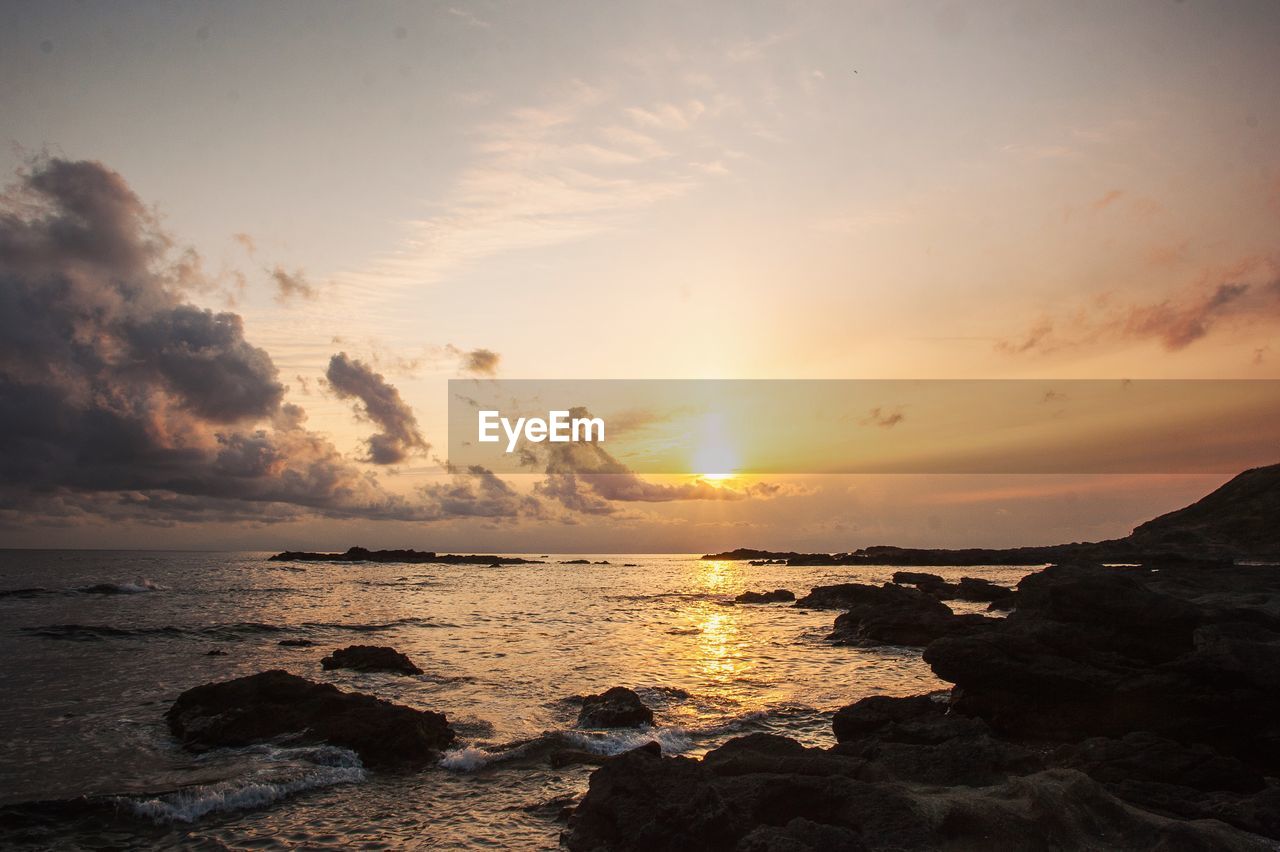 Scenic view of sea during sunset