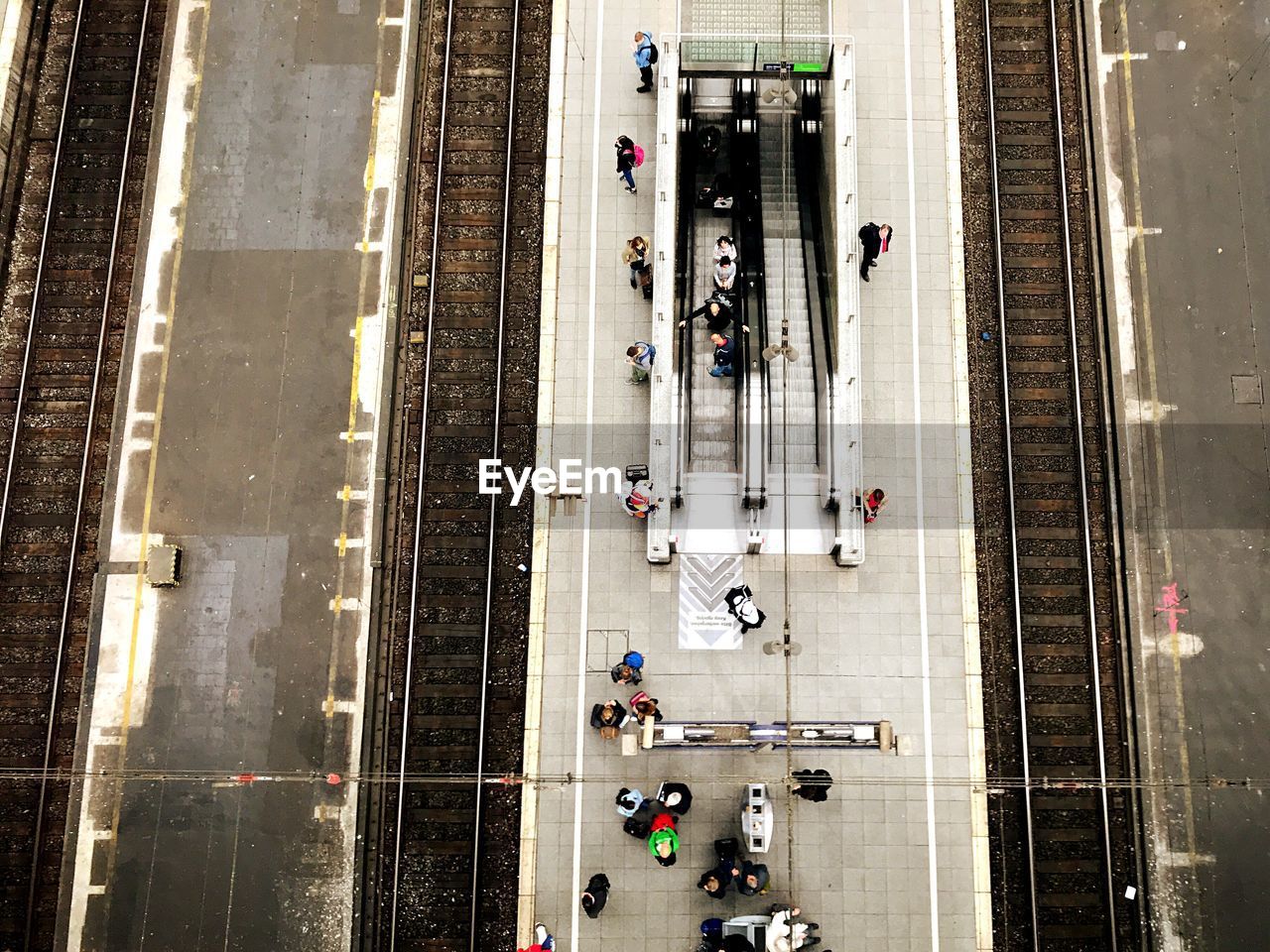 High angle view of people on railroad station platform