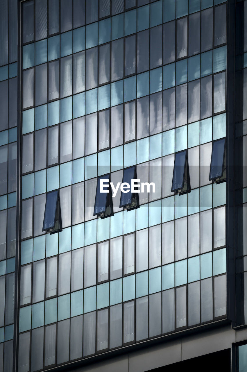 low angle view of modern building against sky