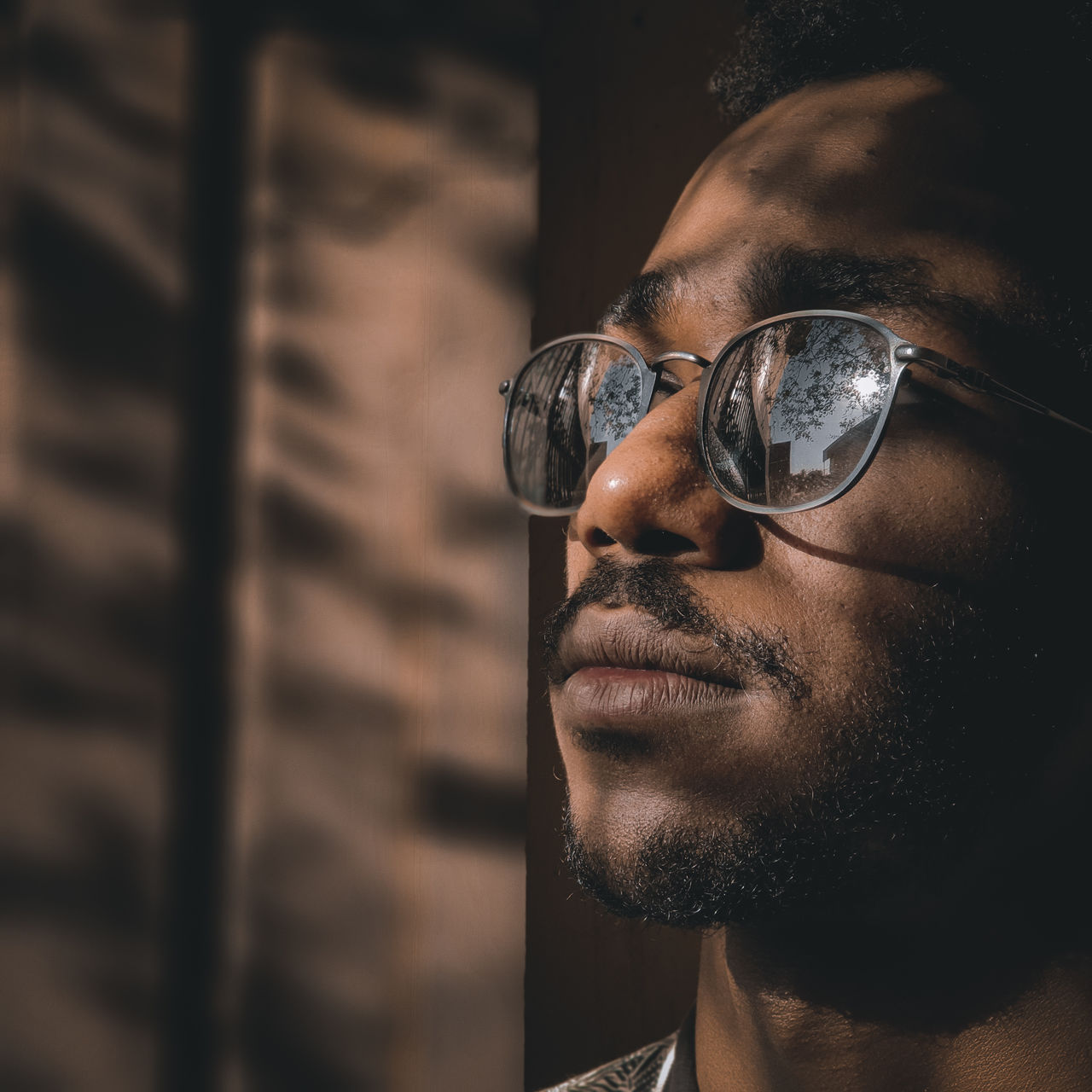 Close-up of young man wearing sunglasses