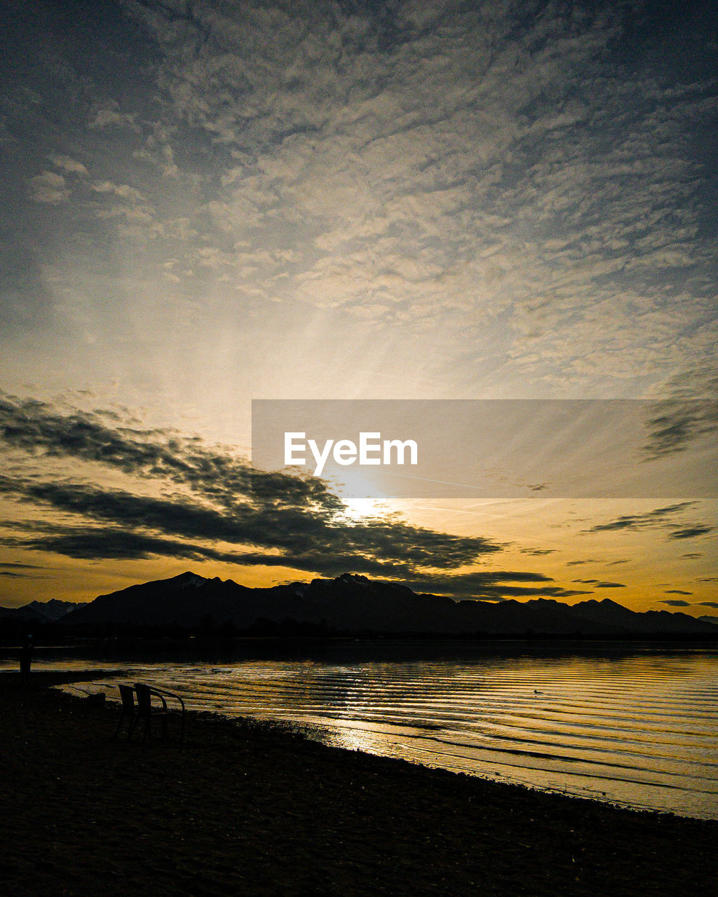 SCENIC VIEW OF SUNSET OVER SEA