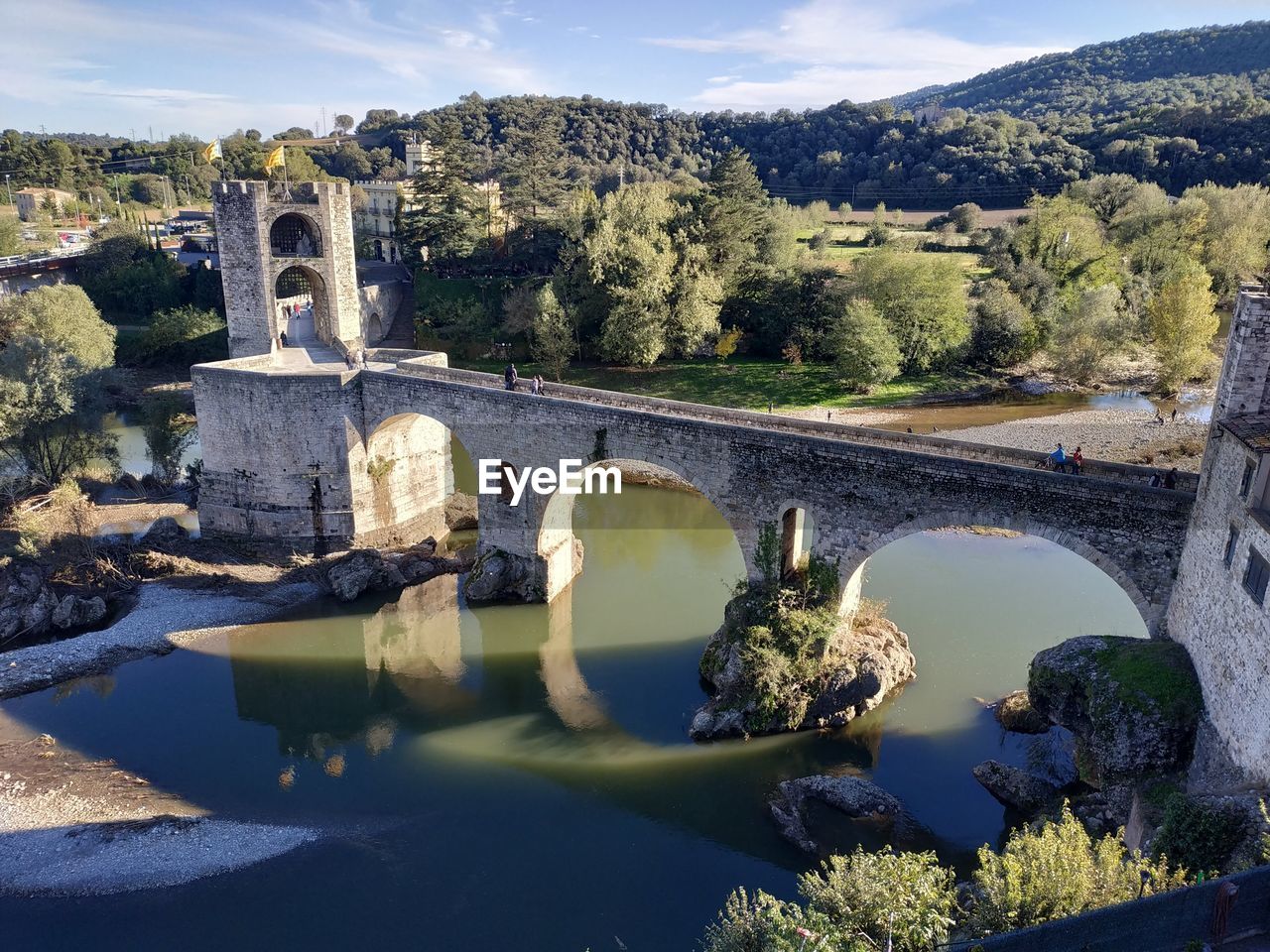 Arch bridge over river