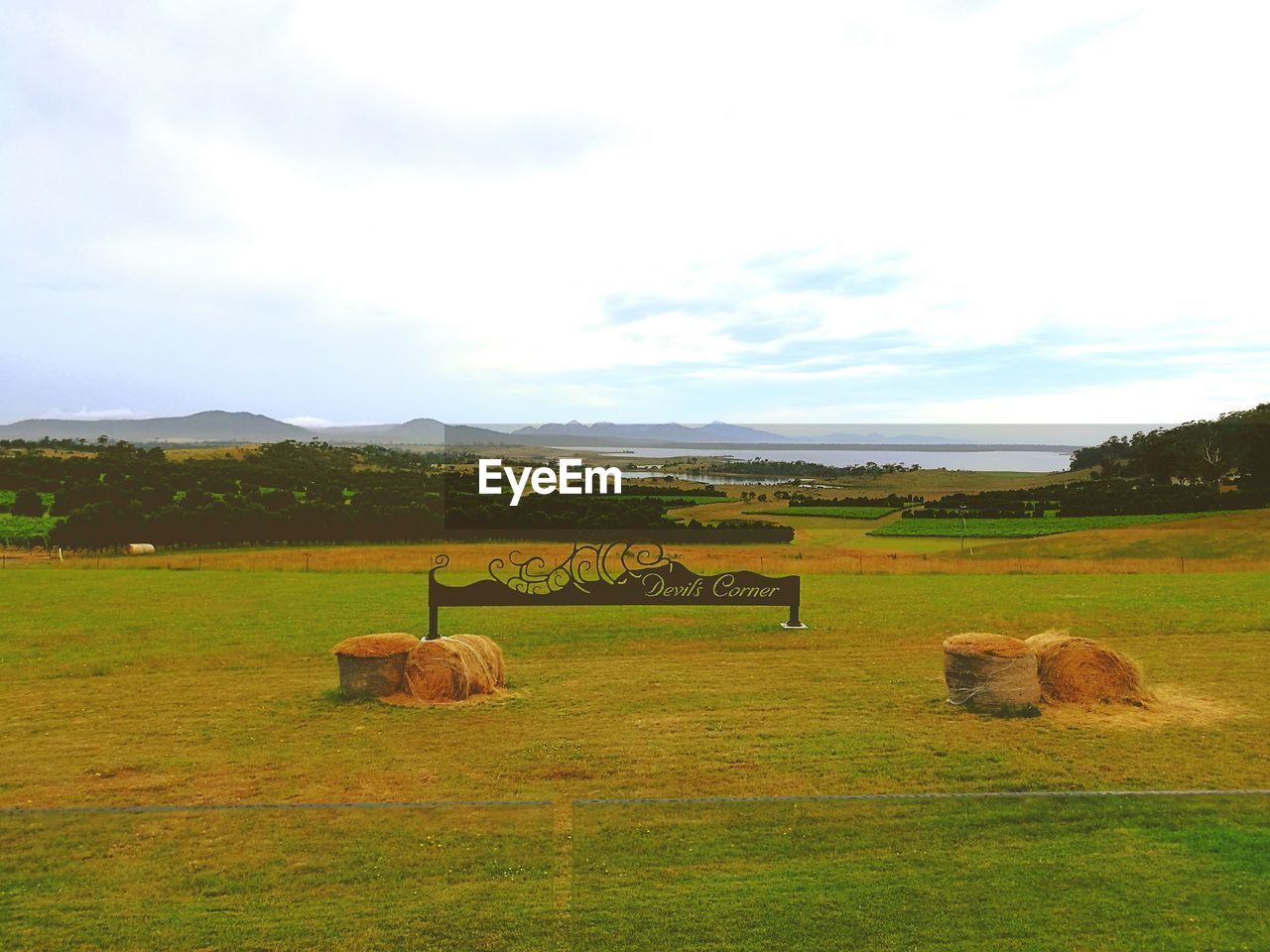 SCENIC VIEW OF FARM AGAINST SKY