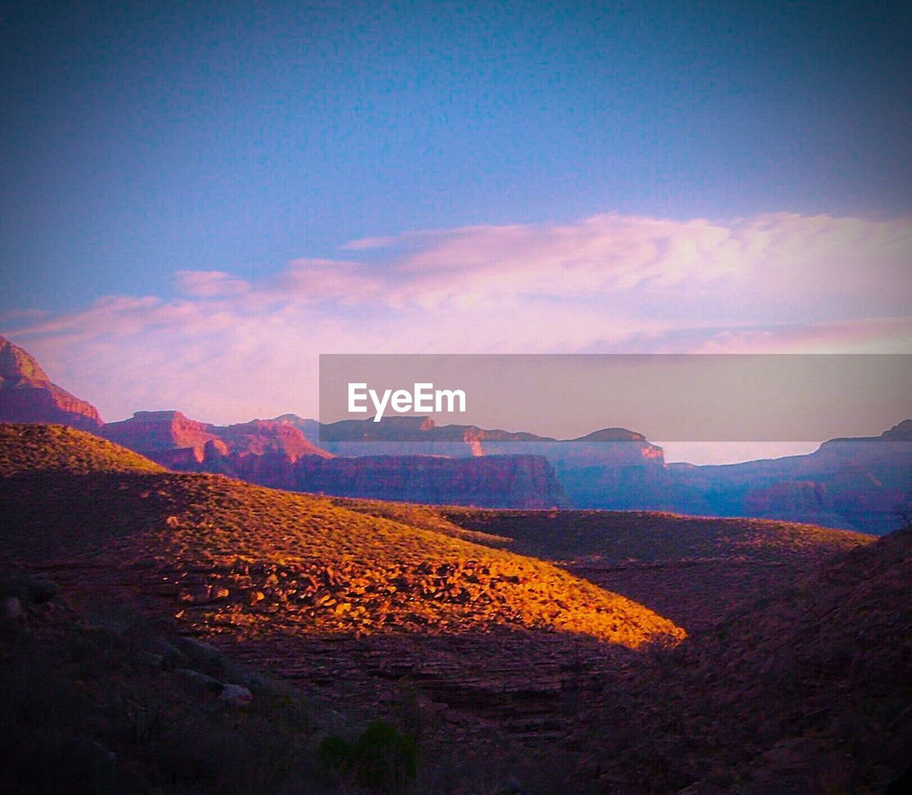 Scenic View Of Grand Canyon Against Cloudy 