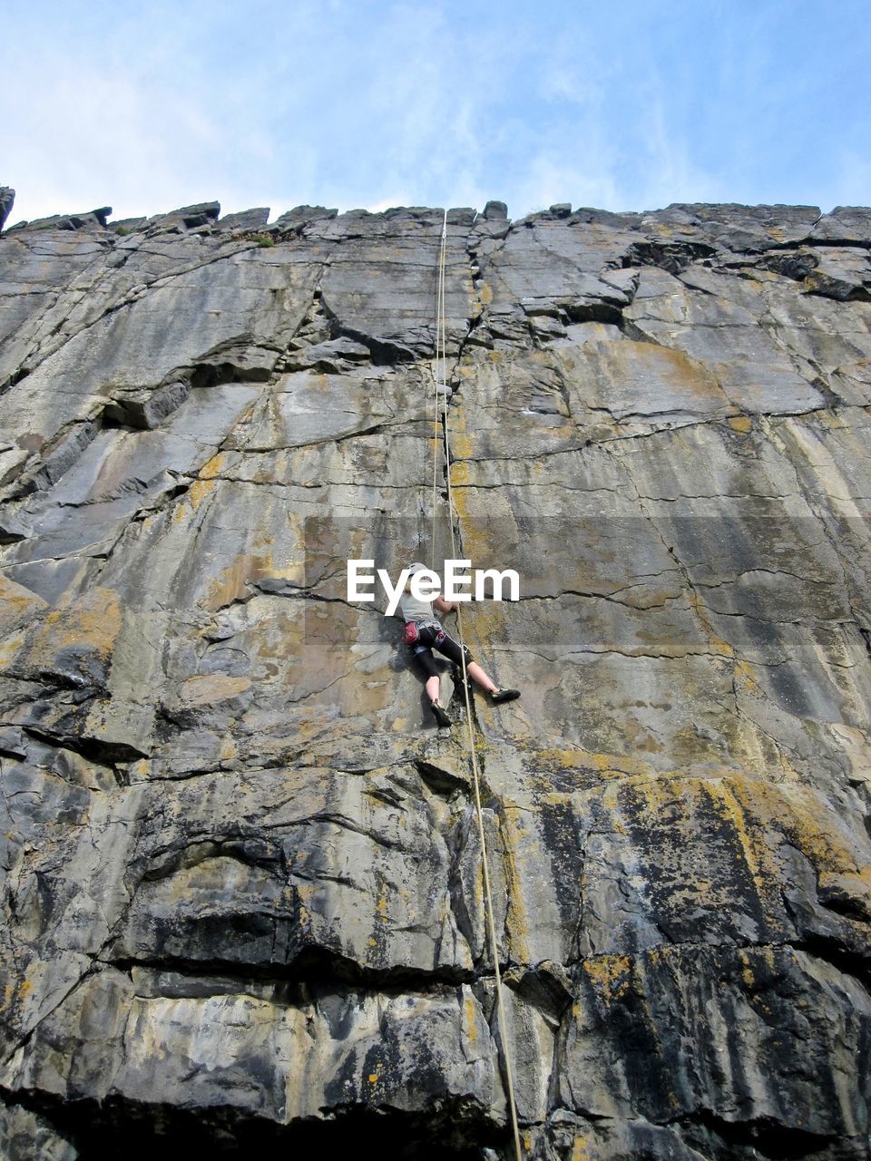 Young girl rock climbing 