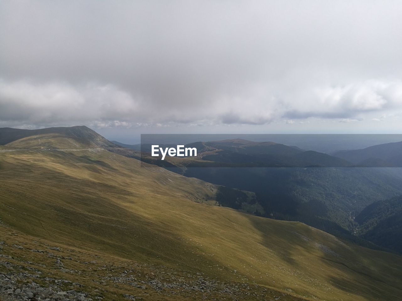 SCENIC VIEW OF MOUNTAIN AGAINST SKY