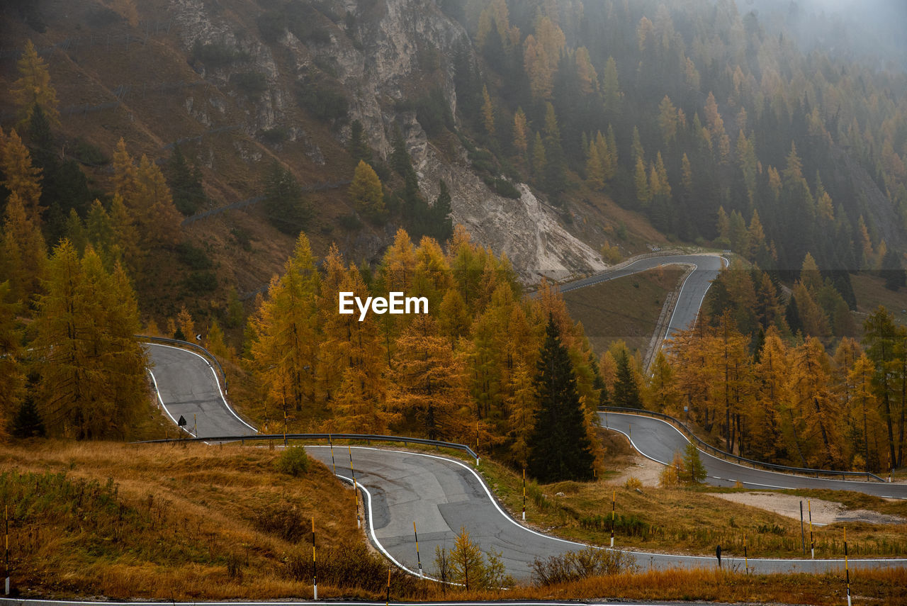 Scenic view of mountain road during autumn