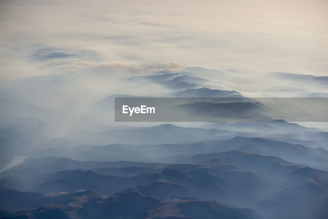 Low angle view of mountain against sky during sunset