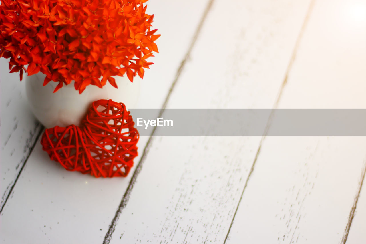 High angle view of red berries on table