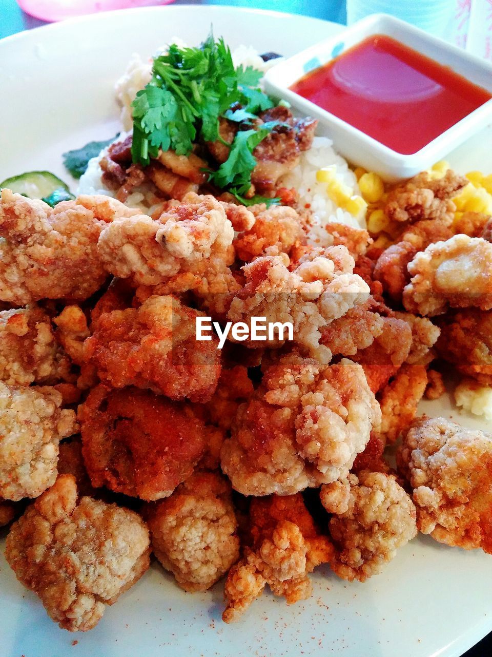Close-up of popcorn chickens on plate