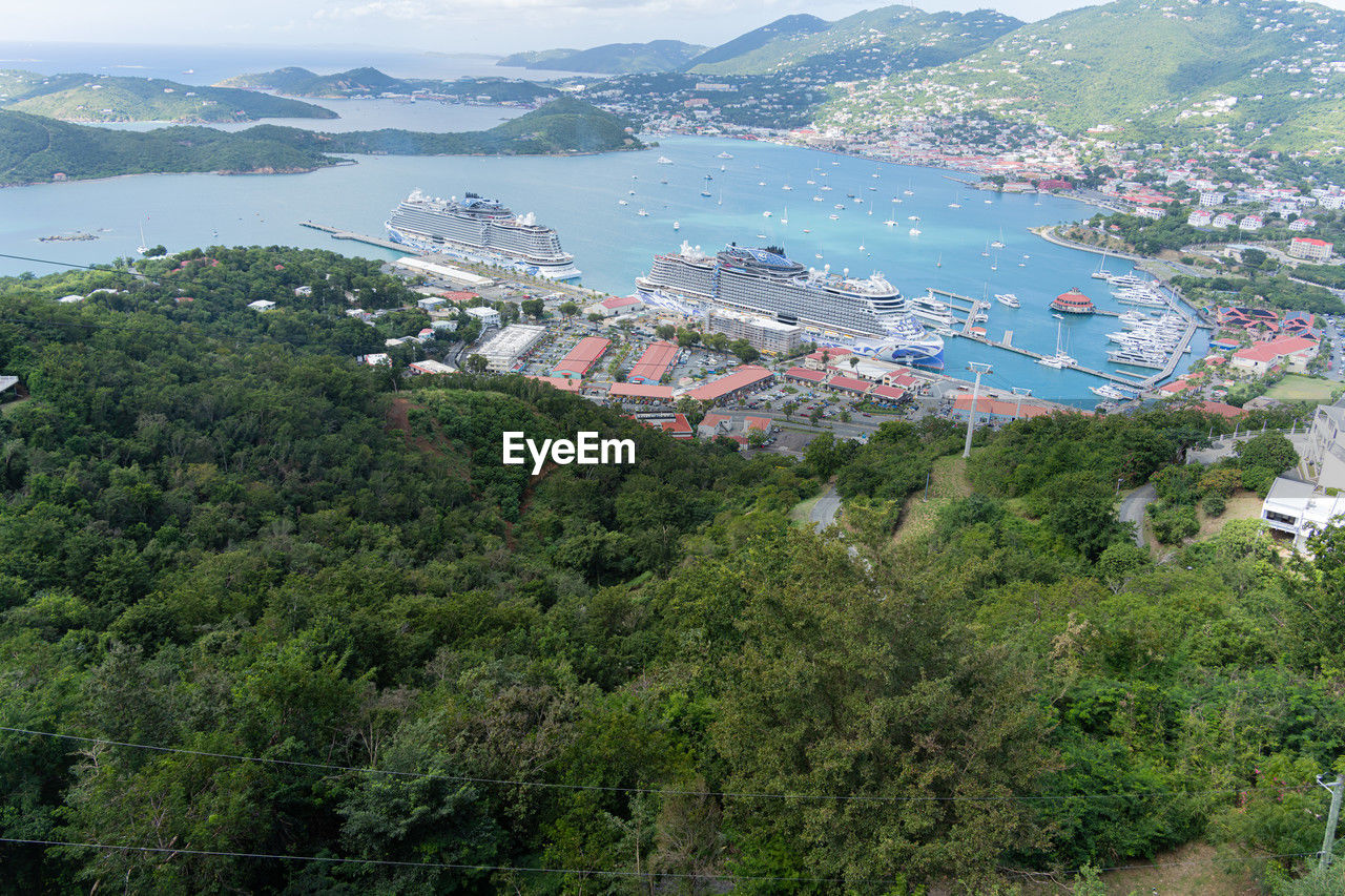 high angle view of townscape by lake