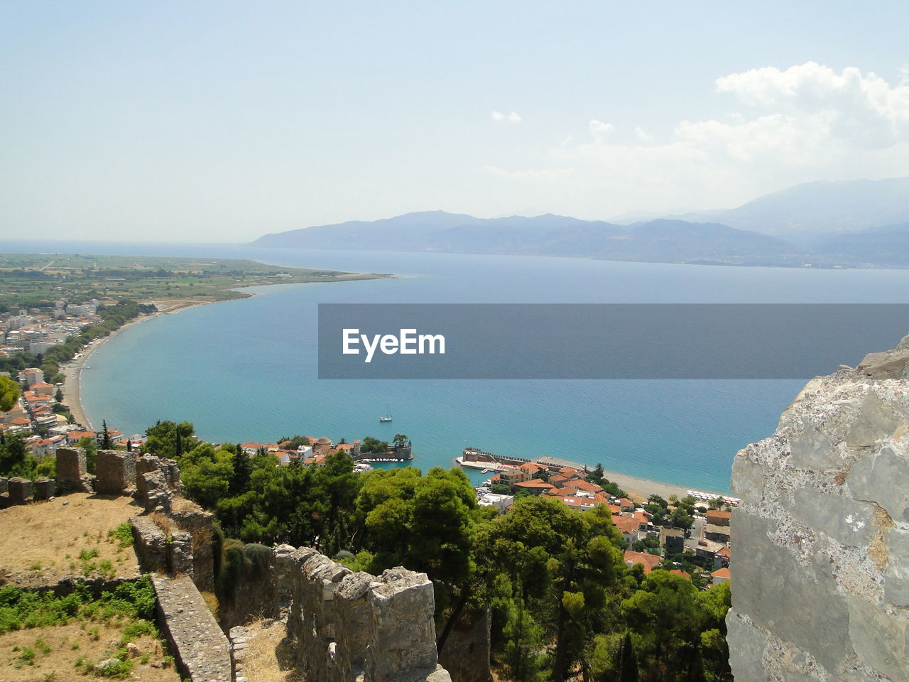 High angle view of town by sea