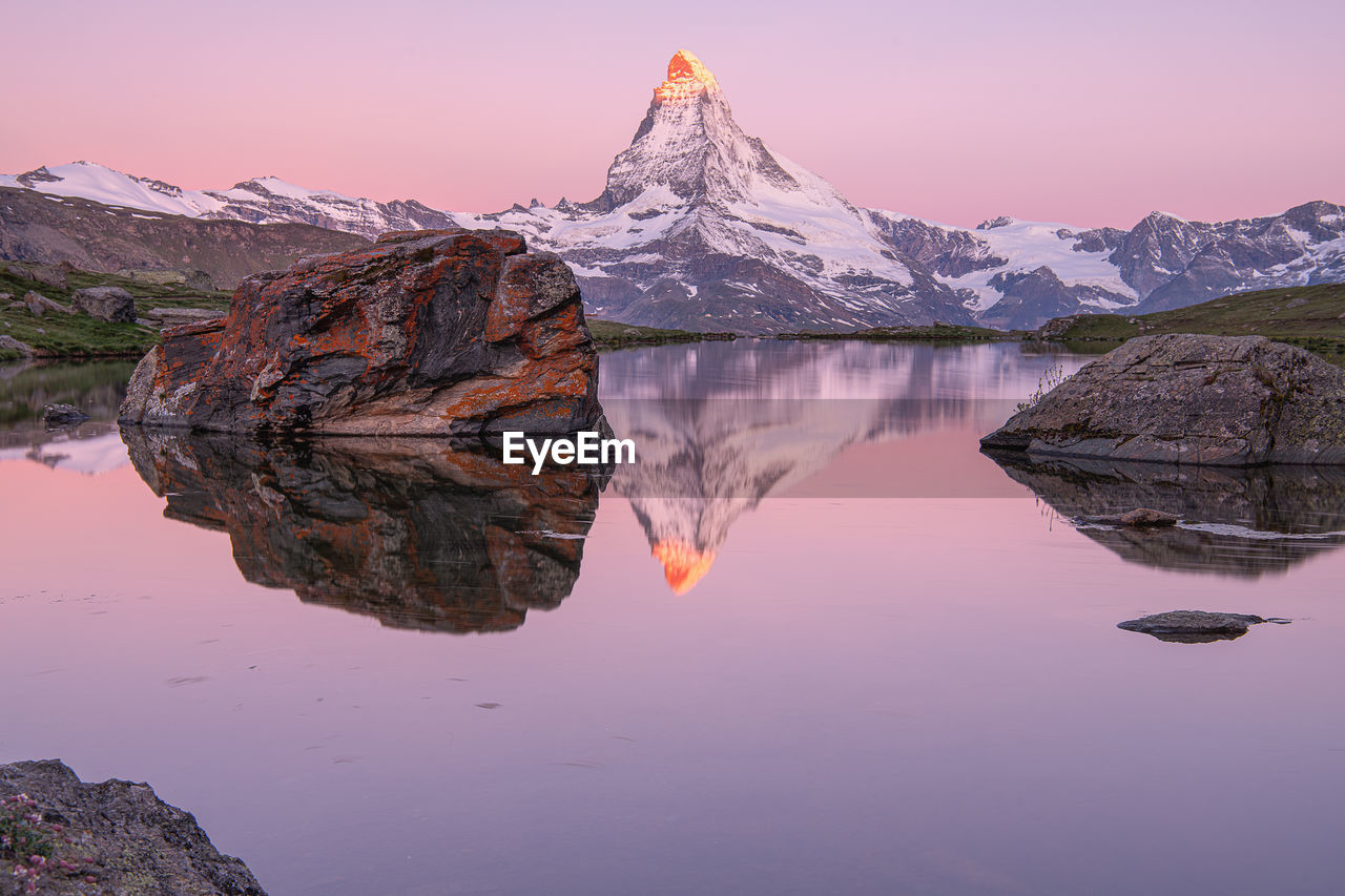 REFLECTION OF CLOUDS IN LAKE