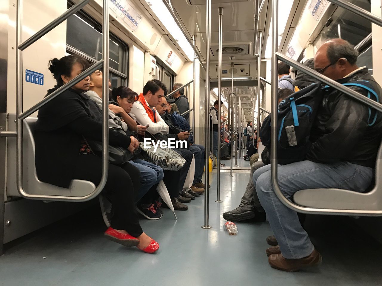 GROUP OF PEOPLE IN TRAIN