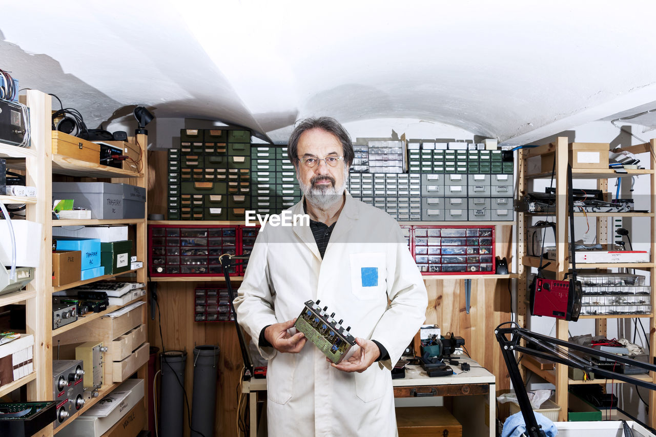 Electronic engineer is working in his laboratory