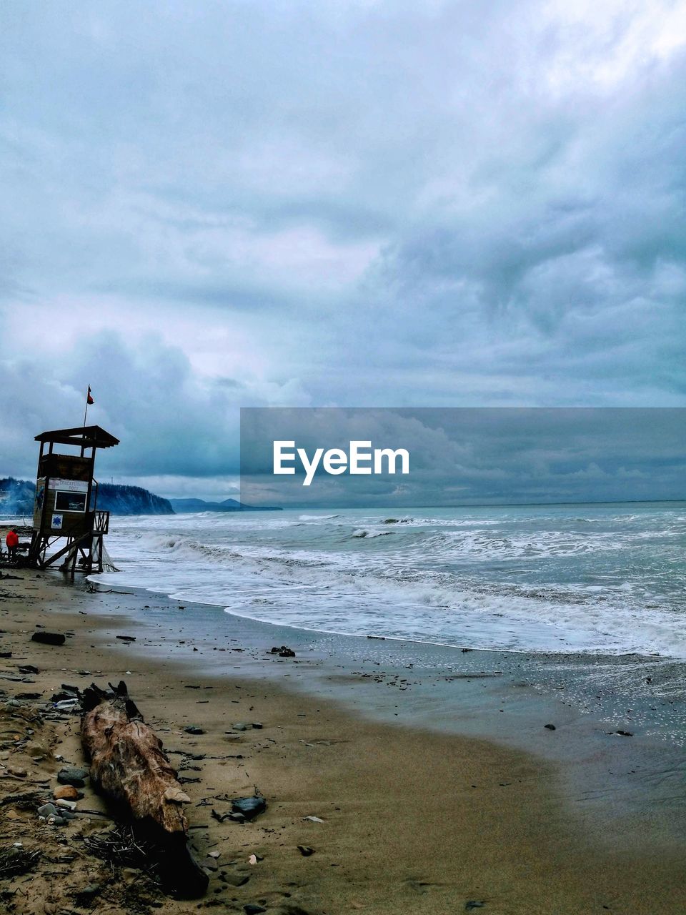 SCENIC VIEW OF BEACH BY SEA AGAINST SKY