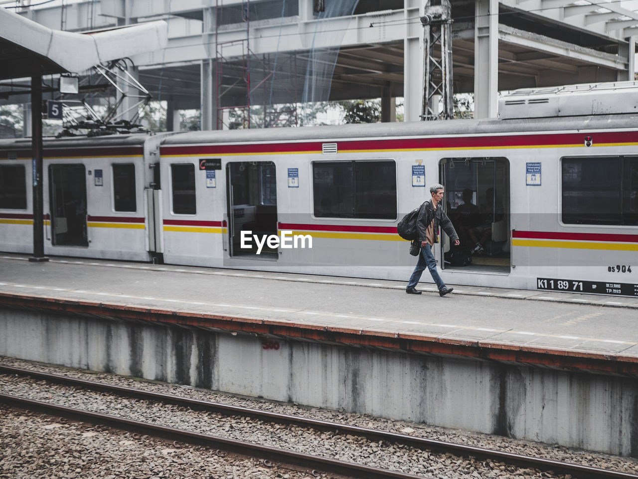 TRAIN AT RAILROAD STATION