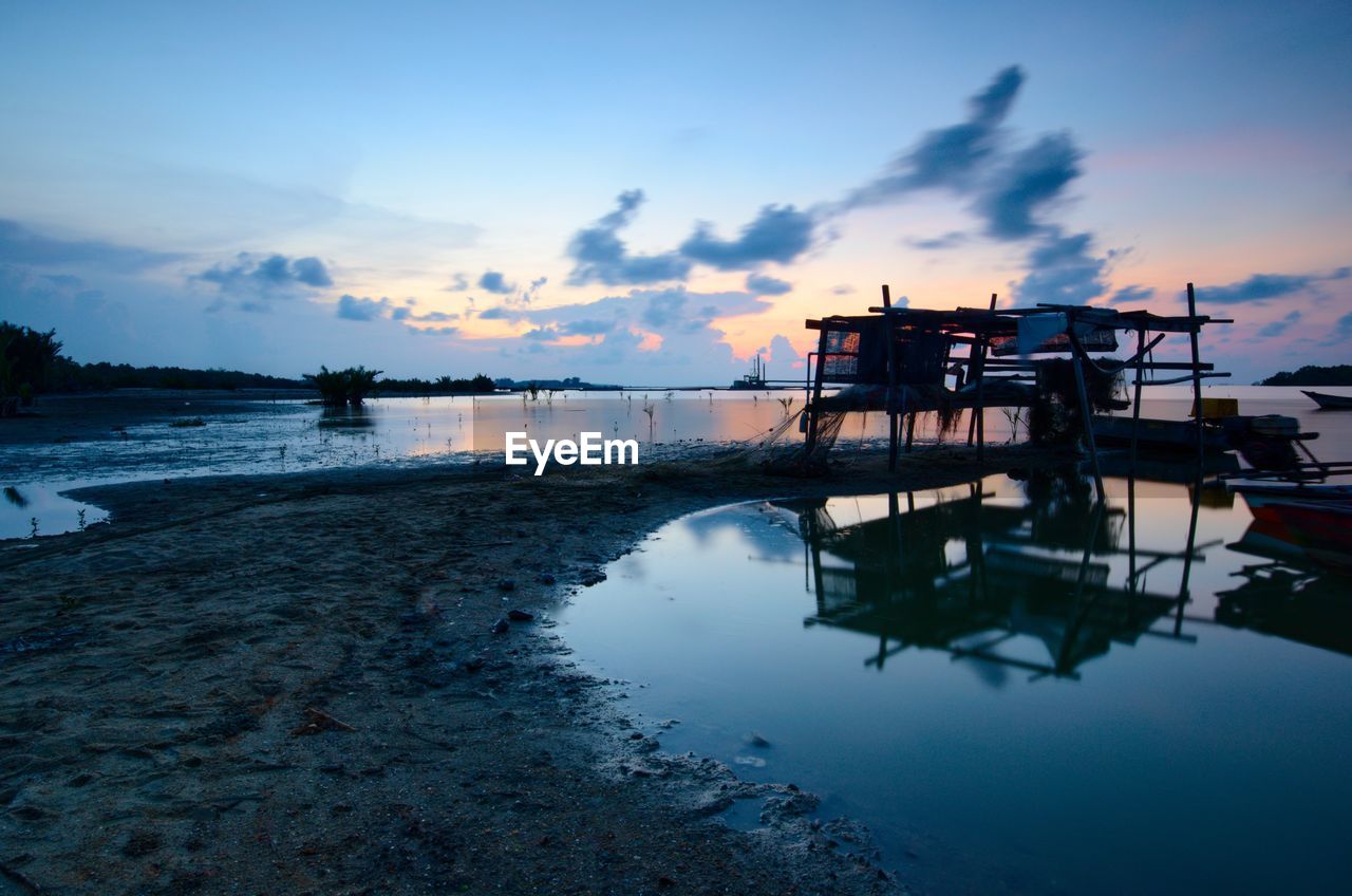 Scenic view of sea against sky at sunset