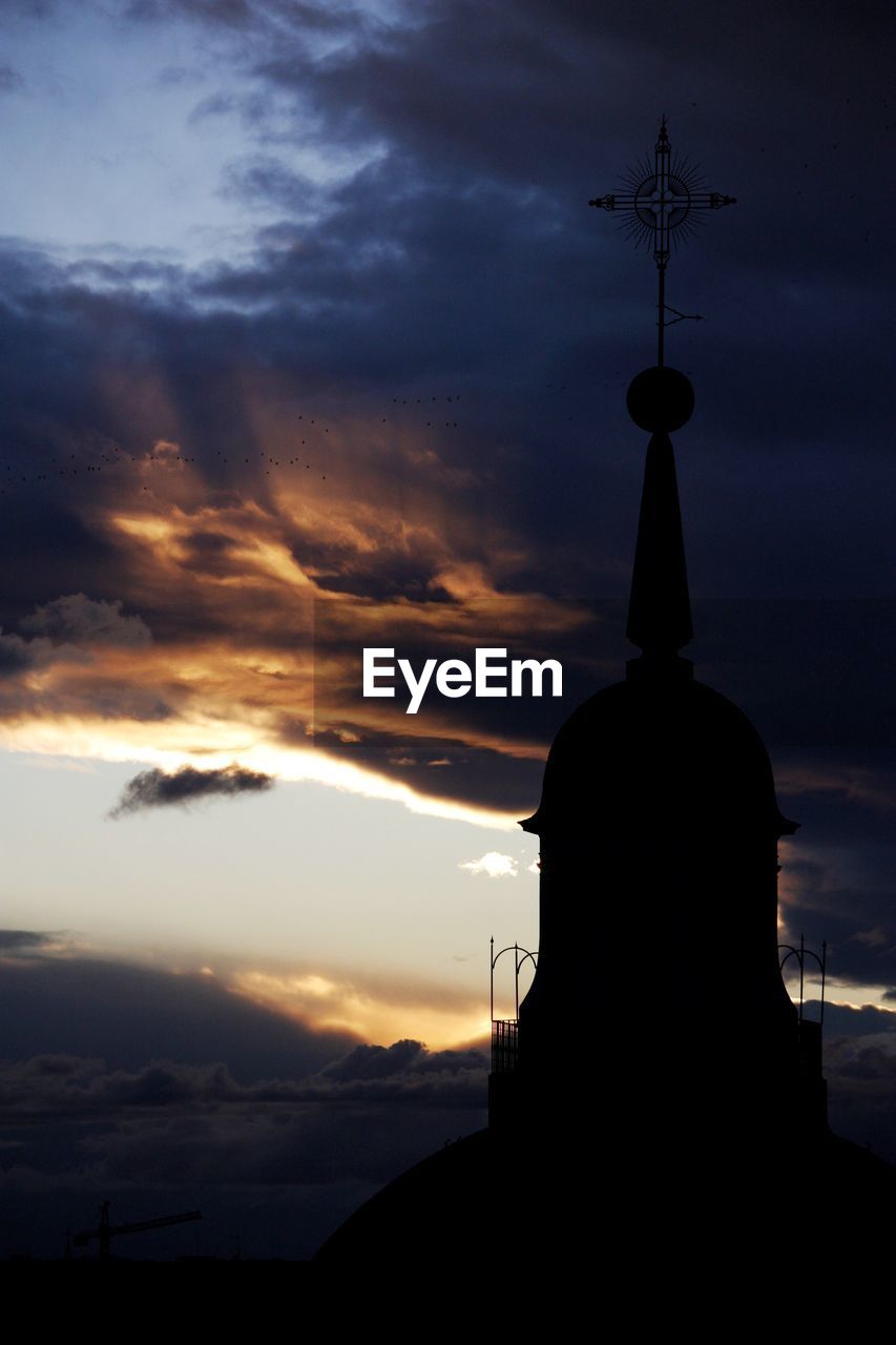 SILHOUETTE TEMPLE AGAINST SKY DURING SUNSET