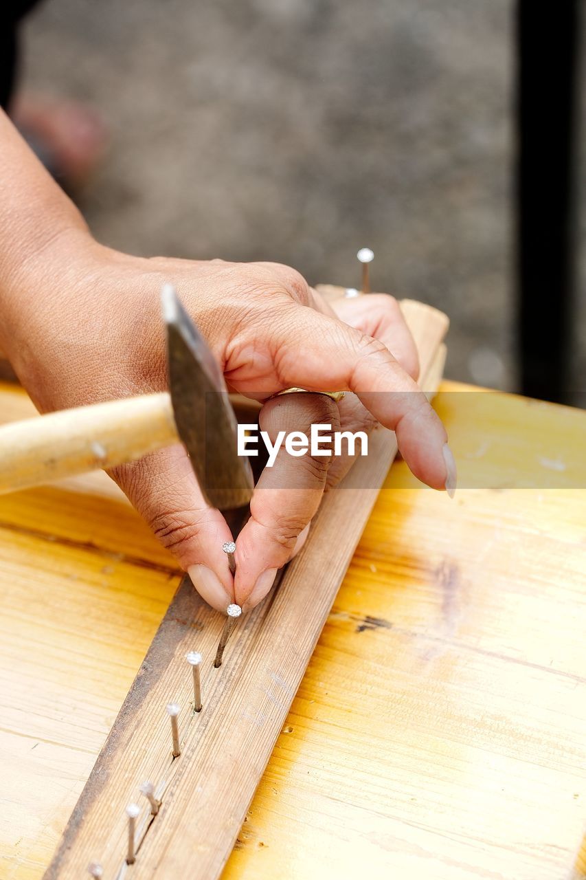 CLOSE-UP OF HANDS WORKING
