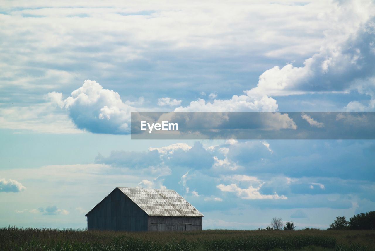 Barn on grassy field