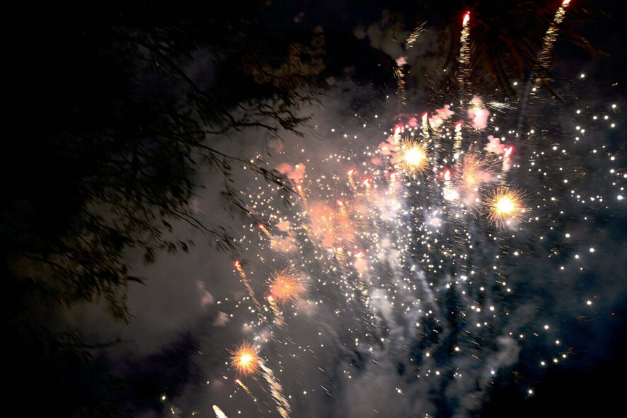 Reflection of fireworks in water