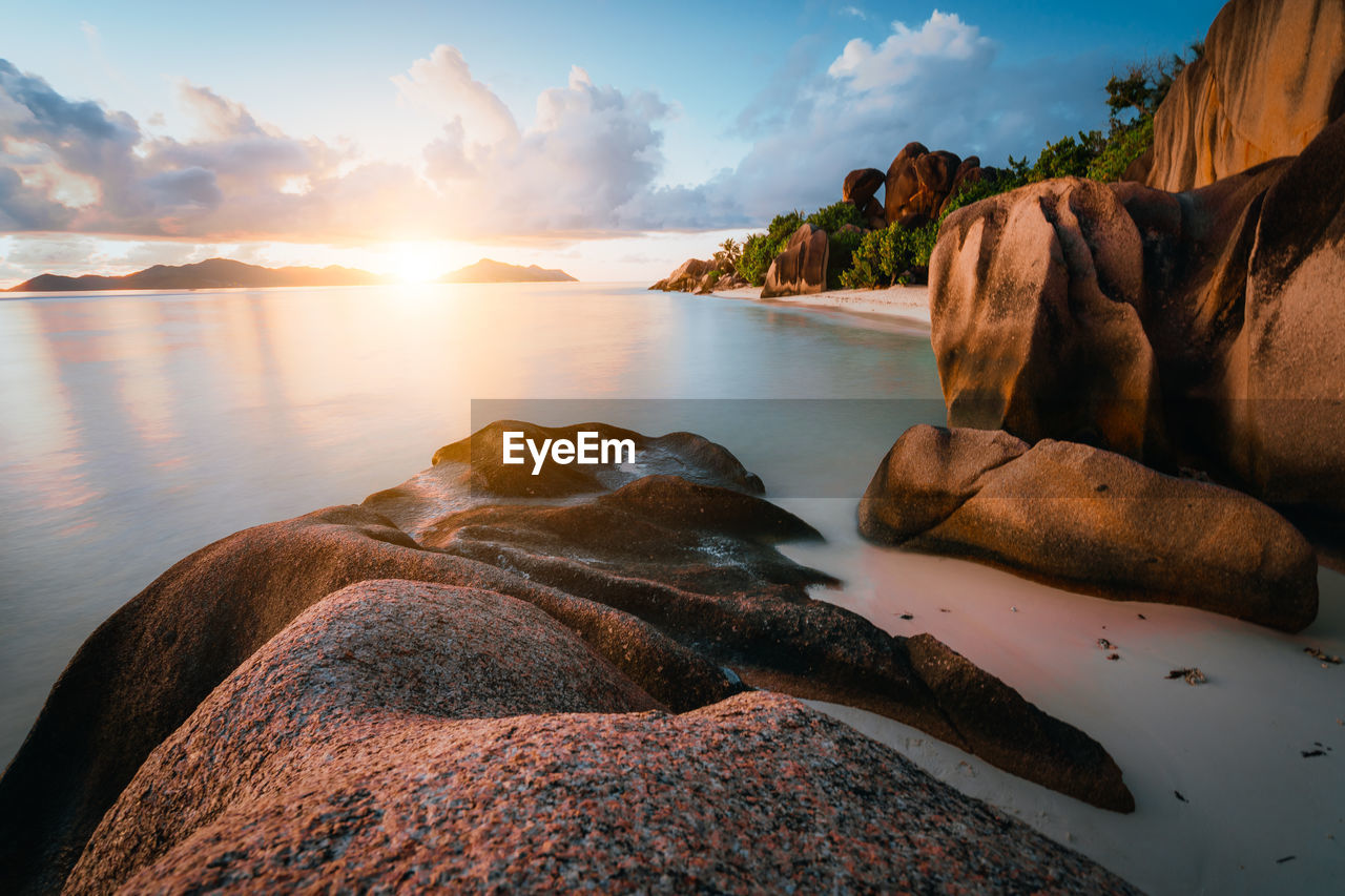 Scenic view of sea against sky at sunset