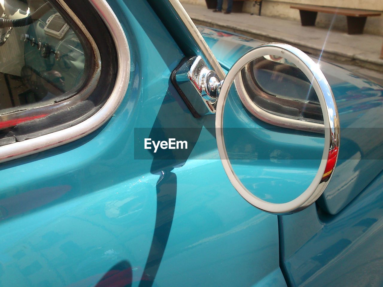 Close-up of car side-view mirror