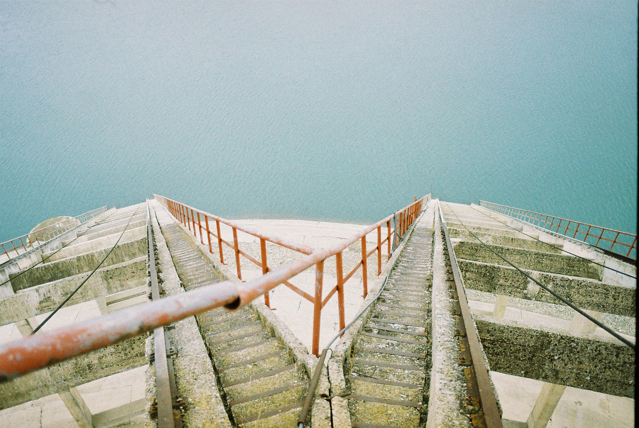 Pier over sea against sky