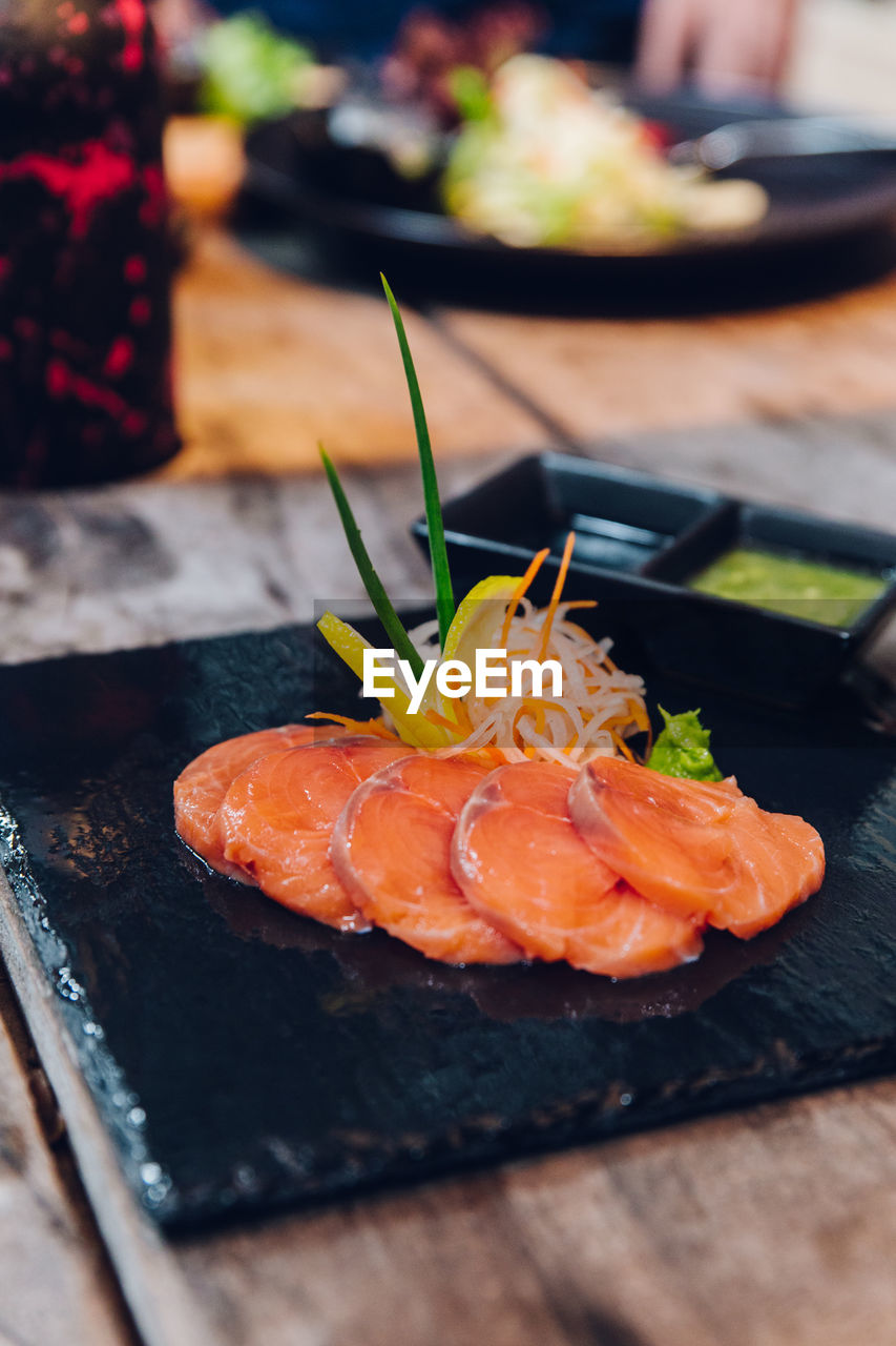 CLOSE-UP OF SUSHI SERVED IN PLATE