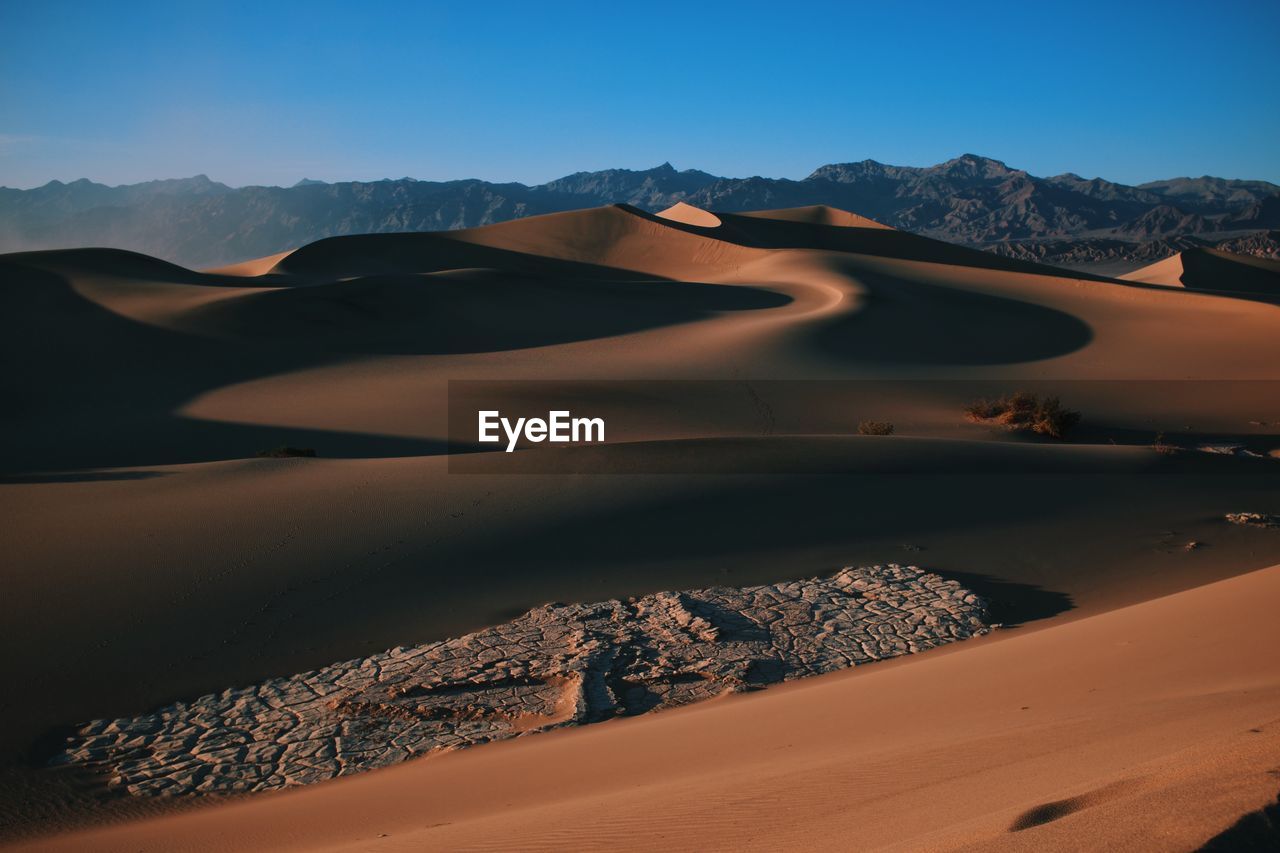 Scenic view of desert against sky