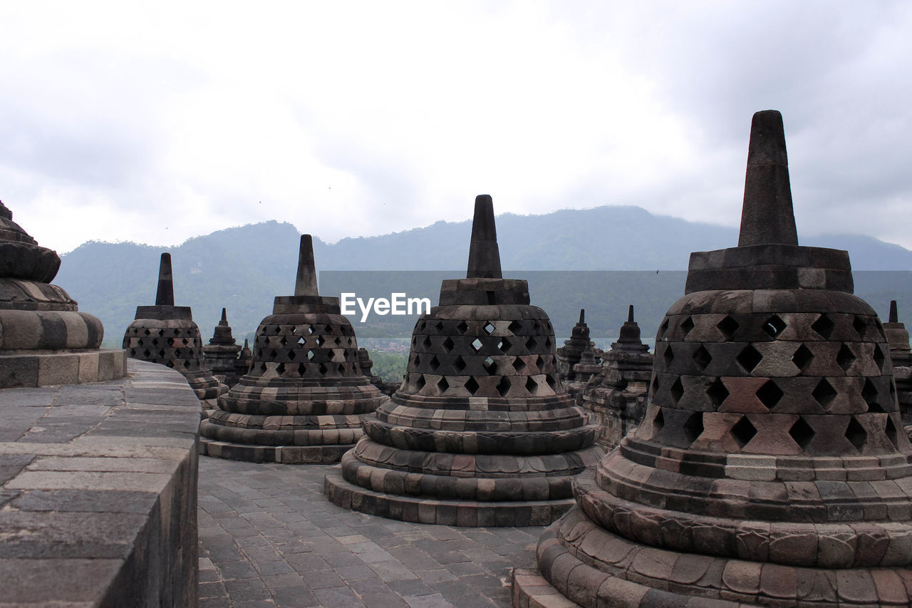 RUINS OF TEMPLE AGAINST SKY