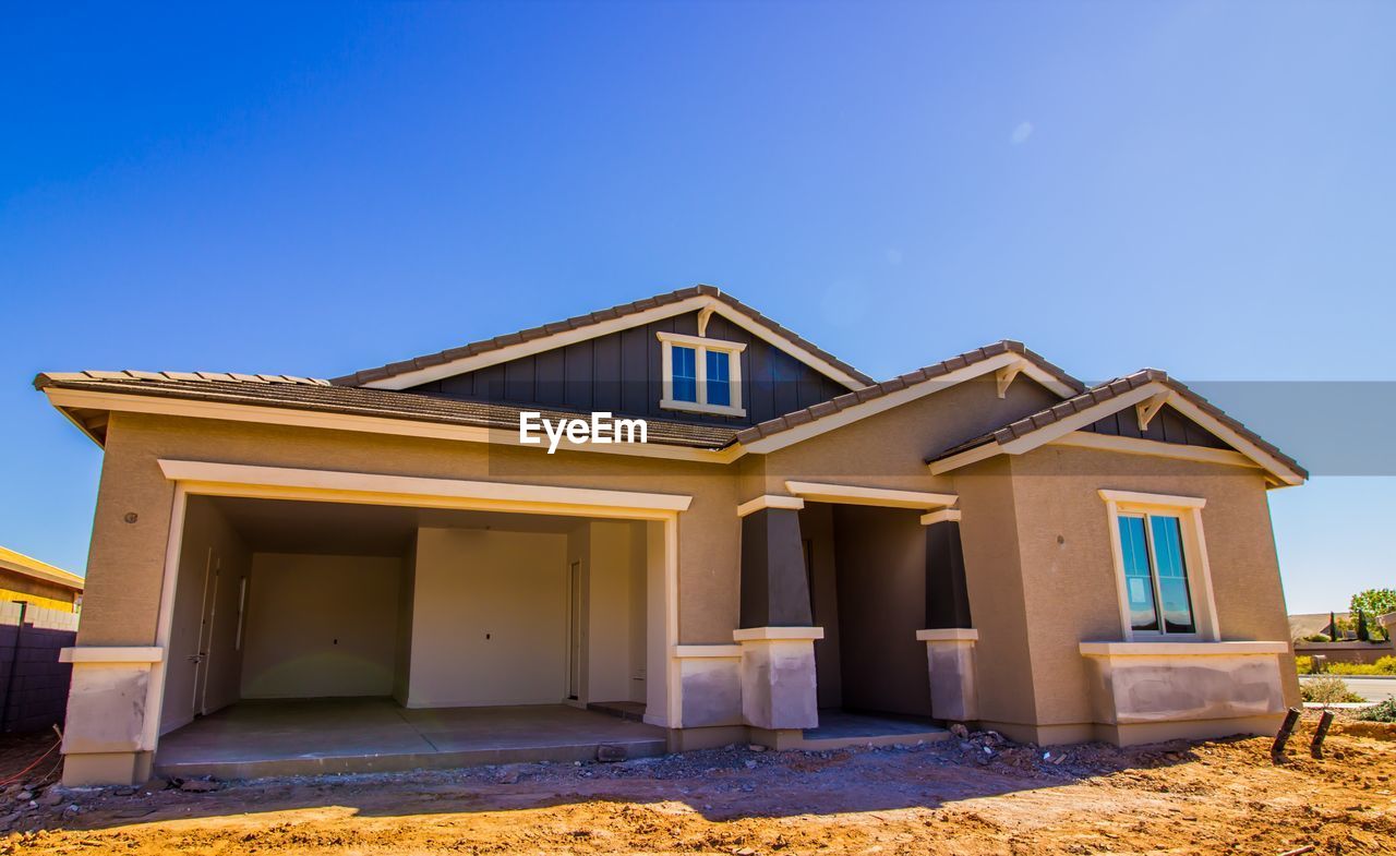 blue, architecture, sky, house, clear sky, built structure, nature, no people, building exterior, facade, building, low angle view, home, day, outdoors, sunny, sunlight