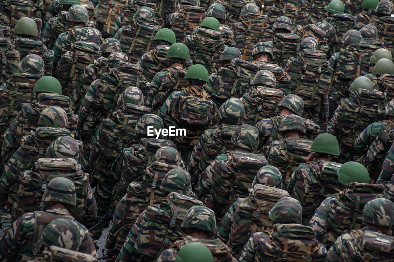 Rear view of army soldiers at parade