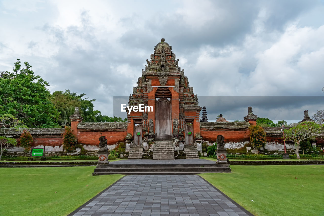 TEMPLE AGAINST BUILDING