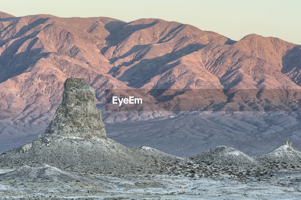 Scenic view of rock formation at desert against sky