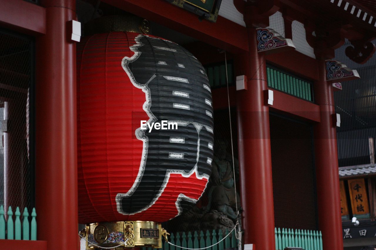 Low angle view of japanese lantern hanging at temple