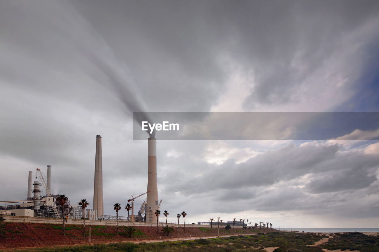 Power plant and a cloudy sky during a stormy day