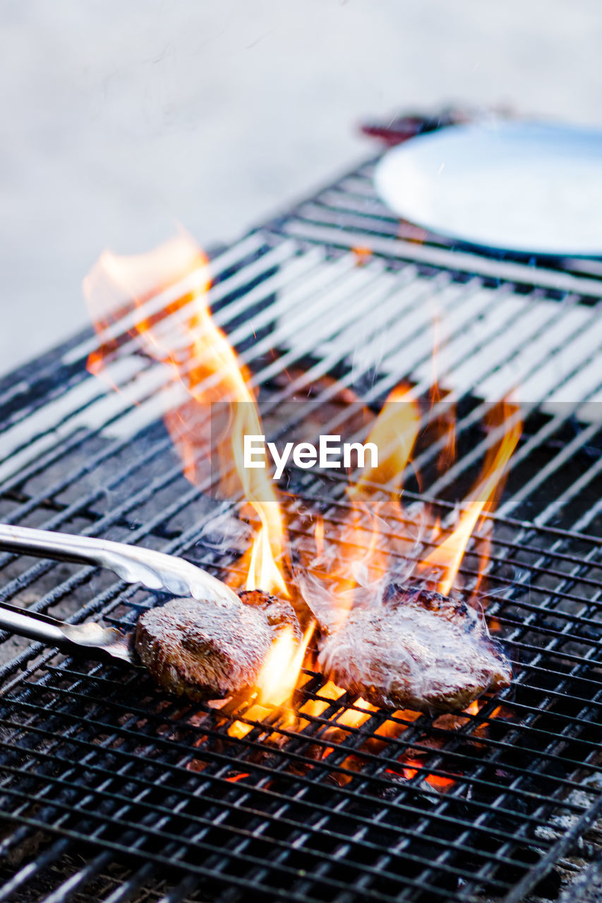 Close-up of fire on barbecue grill