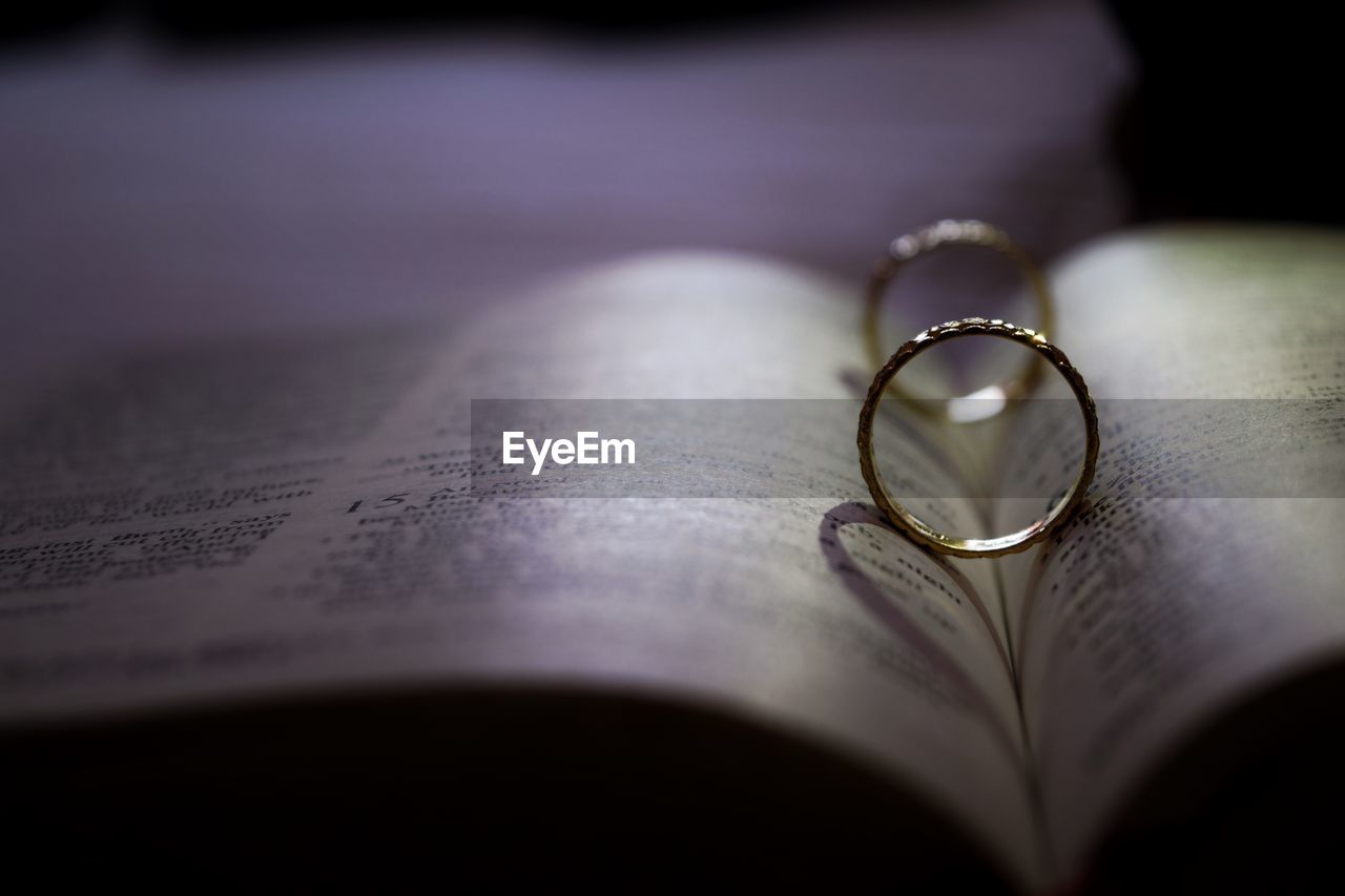 Close-up of heart shape on book