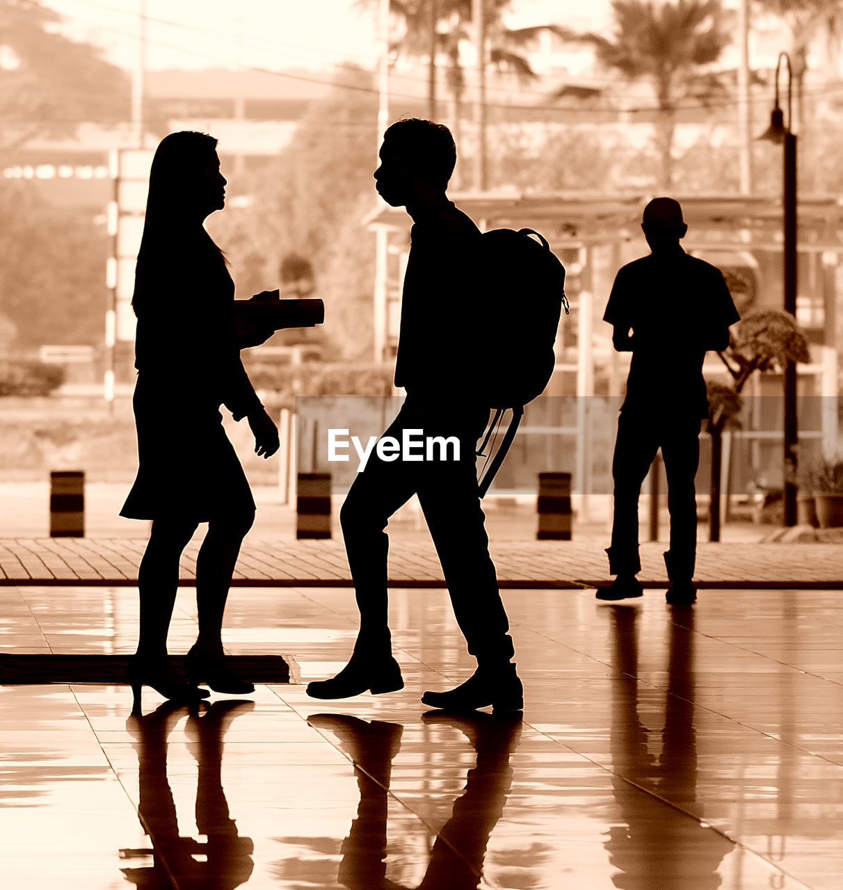 Silhouette people in corridor