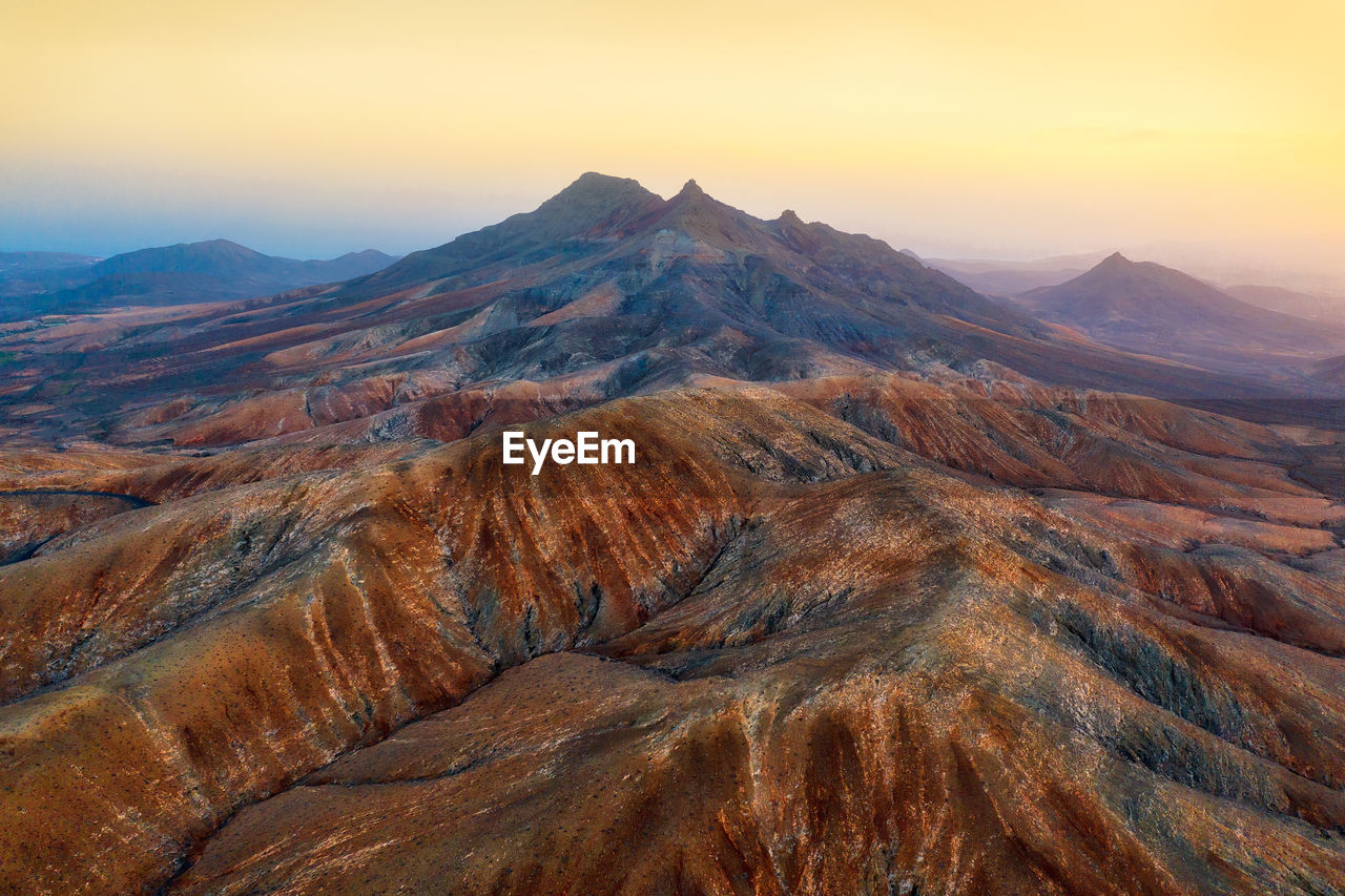 Aerial view of landscape during sunset