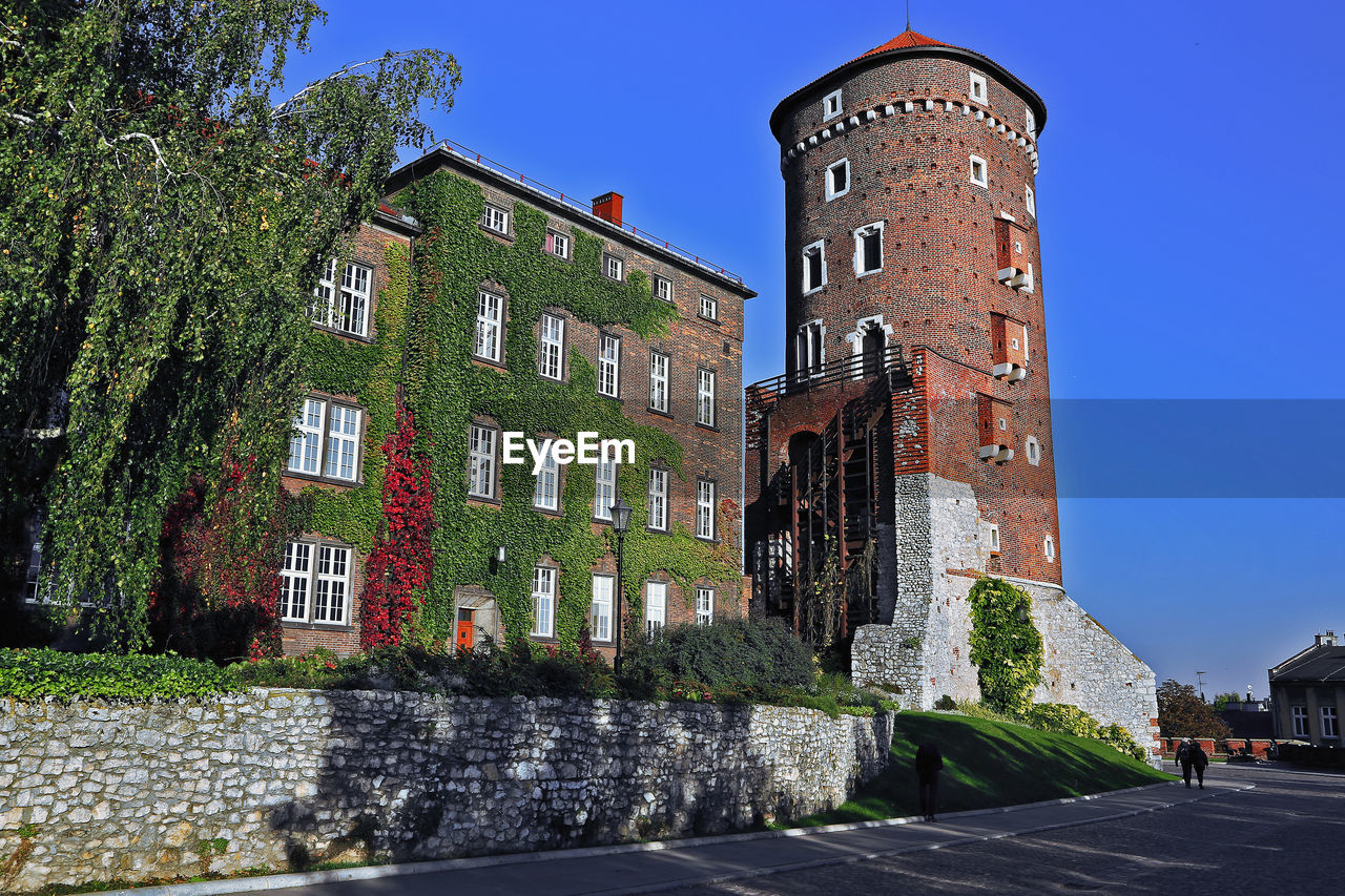 Wawel castle fortress external wall tower with ivy, poland, krakow