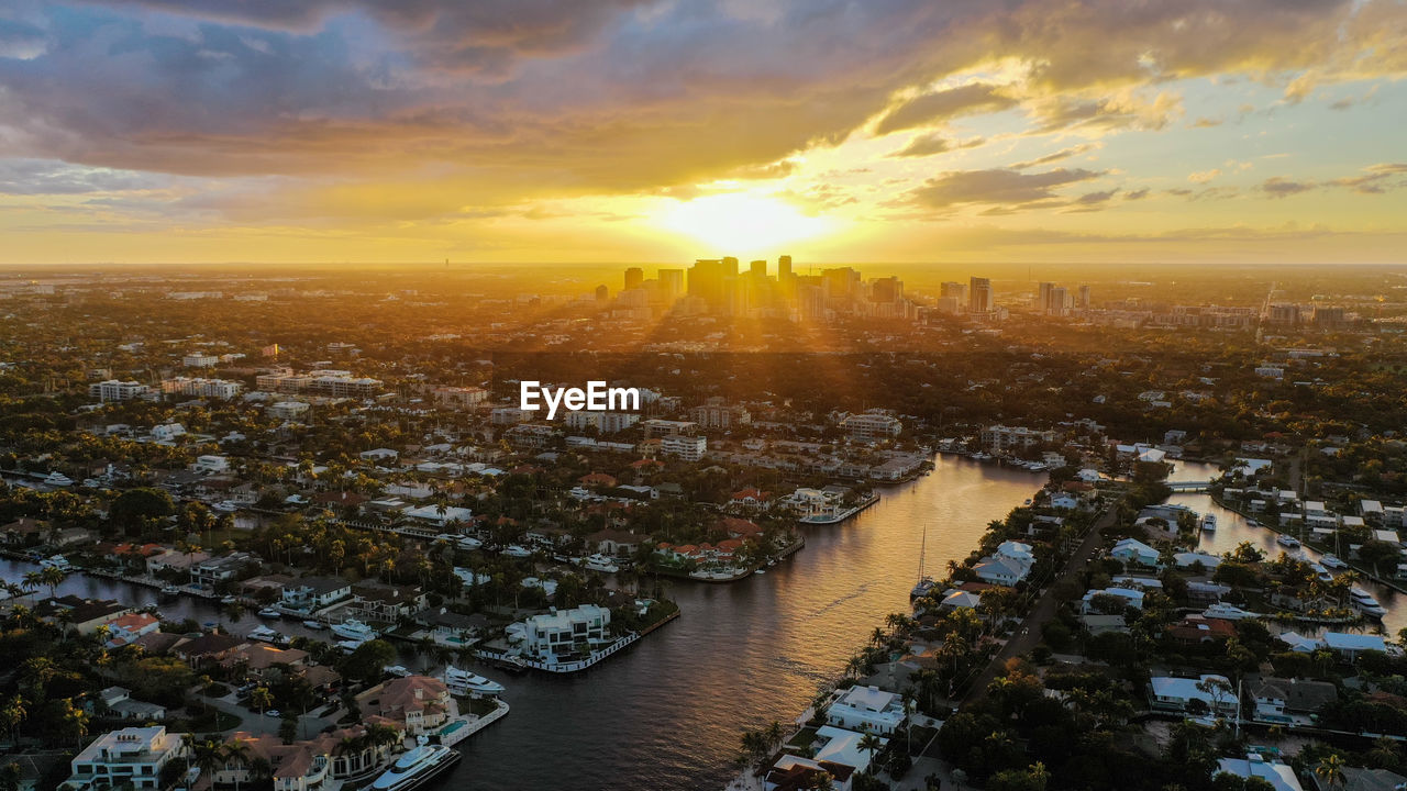 HIGH ANGLE VIEW OF CITY DURING SUNSET