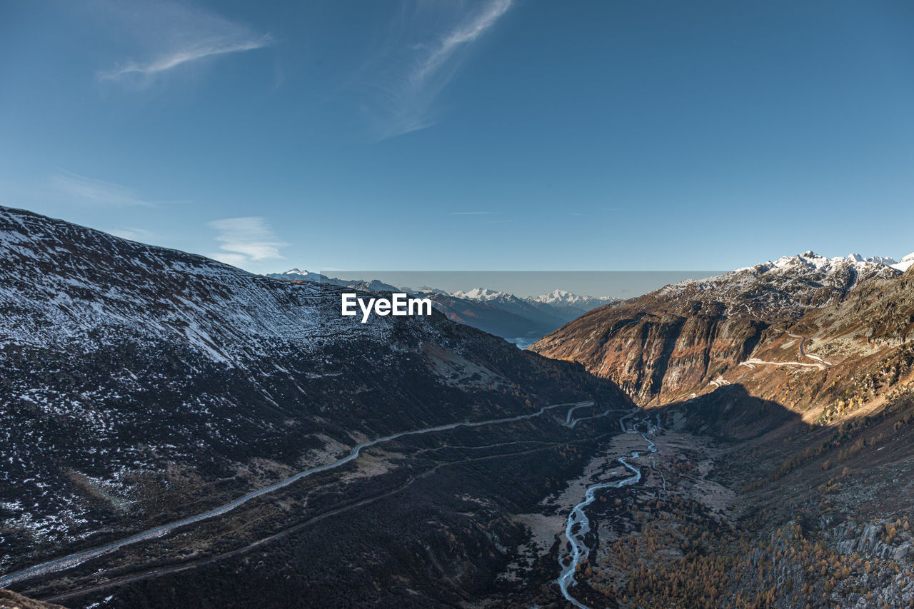 Scenic view of snowcapped mountain against sky