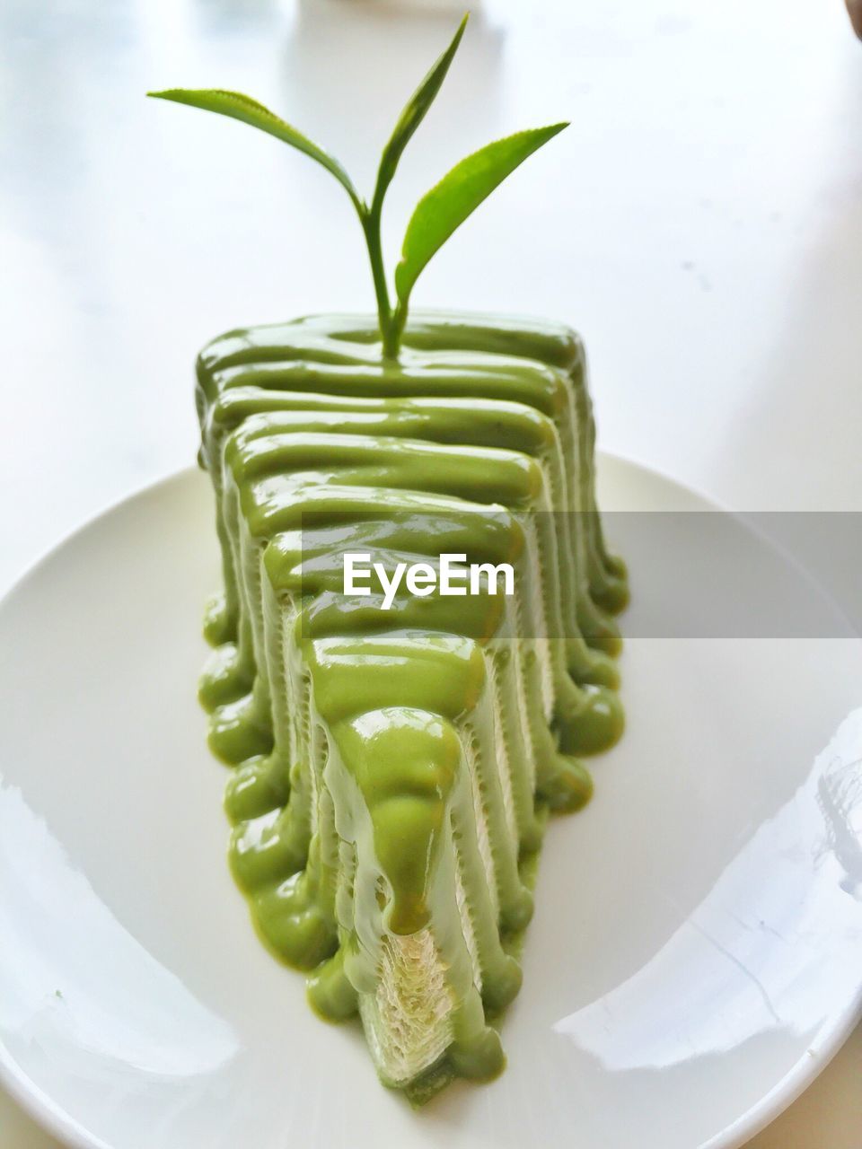 Close-up of green tea pastry in plate