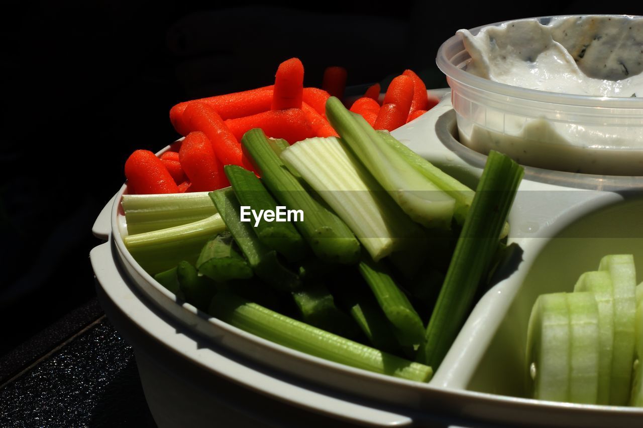 CLOSE-UP OF CHOPPED VEGETABLES IN BOWL OF CONTAINER