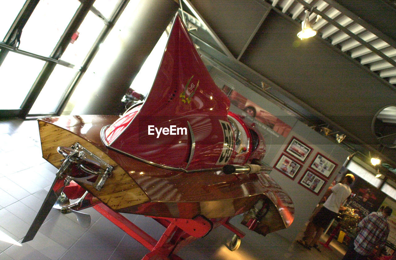 LOW ANGLE VIEW OF FERRIS WHEEL IN NIGHTCLUB