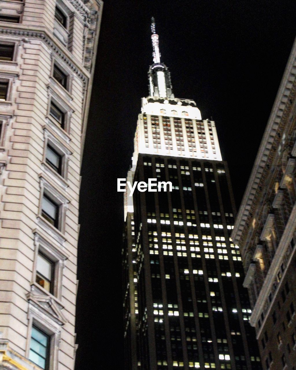 Low angle view of buildings at night