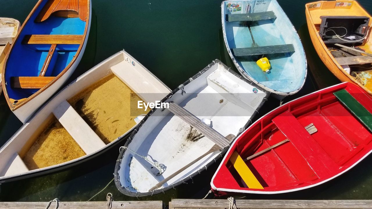 Boats moored at harbor